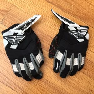 A pair of Fly Racing Motocross Riding Gloves